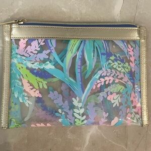 Lilly Pulitzer 
•Sweet Escape Pouch
•Zippered 
•Clear Travel Cosmetic